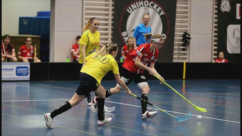 Athlètes de Hockey-balle en pleine action